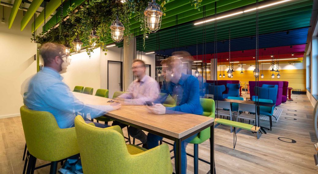 Colourful lounge area on the ground floor of the AKQUINET house at Werner-Otto-Strasse 6 in Hamburg