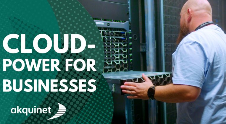 An employee installs a rack in the data centre